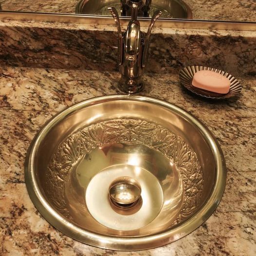 brass bathroom sink coated with ProtectaClear to prevent tarnish and smudgy fingermarks
